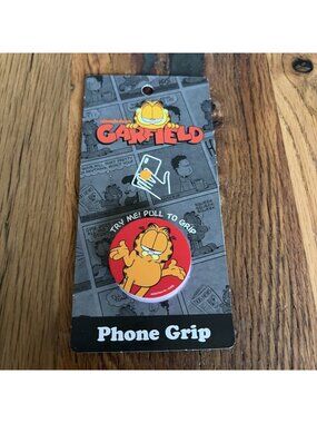 Nickelodeon￼“ Garfield “ Phone grip/stand. NEW Cartoons Throw Back 80s🔥 IDK Cat
